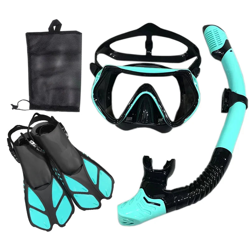 Image of a complete lightweight snorkel set featuring a panoramic mask, dry-top snorkel, and adjustable flippers, neatly displayed on a beach towel. Perfect for travelers seeking compact and comfortable snorkeling gear for underwater exploration.