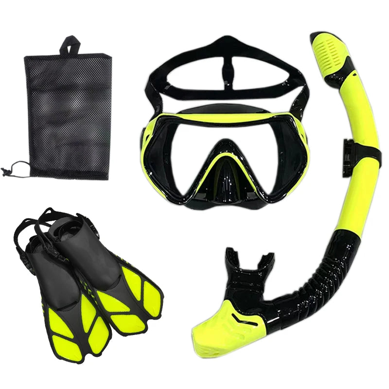 Image of a complete lightweight snorkel set featuring a panoramic mask, dry-top snorkel, and adjustable flippers, neatly displayed on a beach towel. Perfect for travelers seeking compact and comfortable snorkeling gear for underwater exploration.