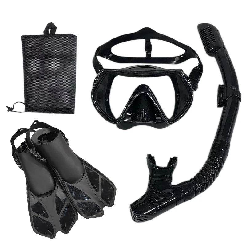 Image of a complete lightweight snorkel set featuring a panoramic mask, dry-top snorkel, and adjustable flippers, neatly displayed on a beach towel. Perfect for travelers seeking compact and comfortable snorkeling gear for underwater exploration.