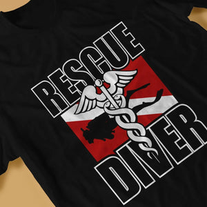 Rescue Diver T-Shirt with bold 'Rescue Diver' text and scuba diving graphic, made from soft broadcloth fabric, relaxed fit, ideal for certified rescue divers to showcase skills and promote scuba safety awareness; perfect for casual wear, dive shops, and marine events.